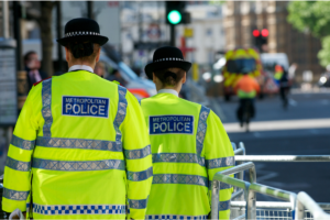 Two Metropolitan POlice officers walk on the beat